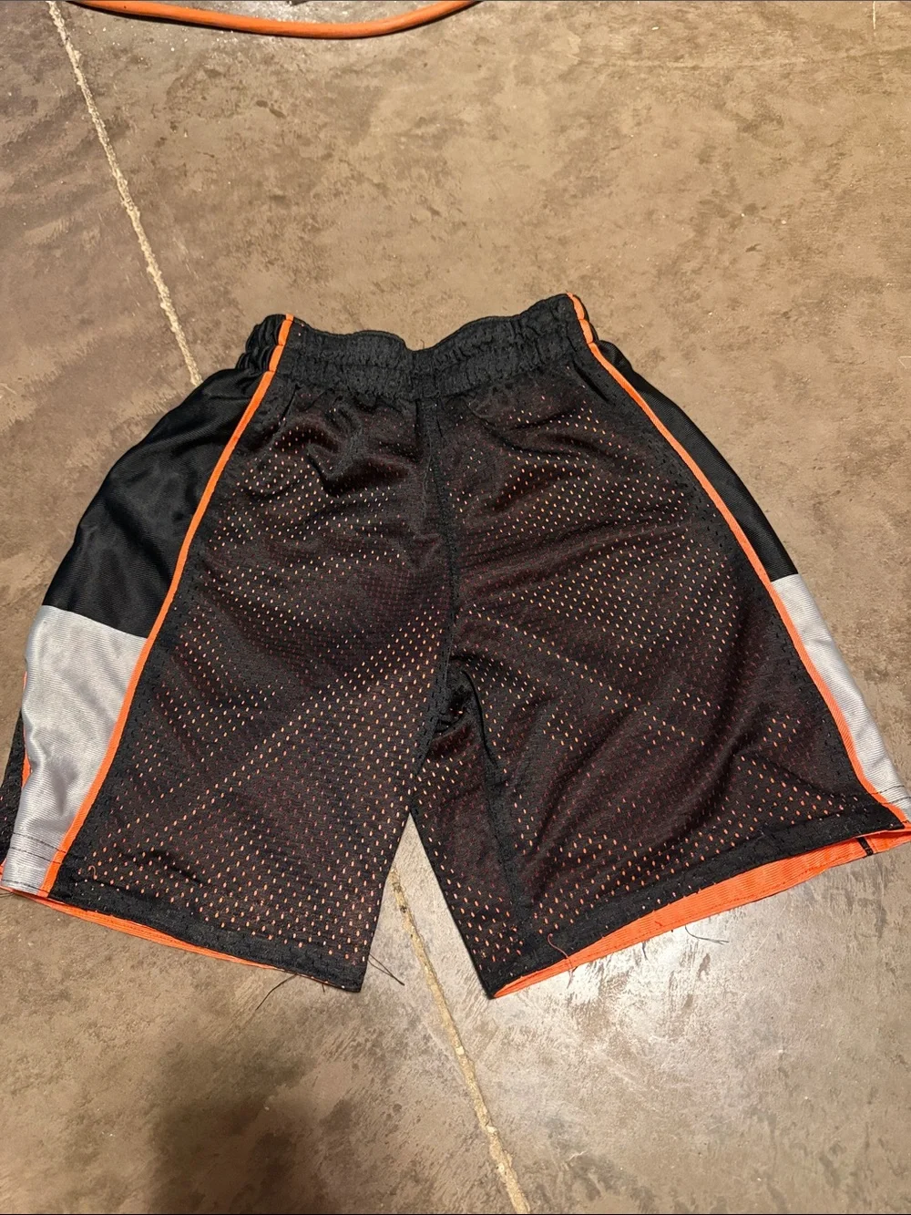 Kids Black Mesh Athletic Shorts with Orange Trim